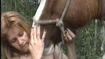 Amazing bestiality-loving girl 18+ and her horse
